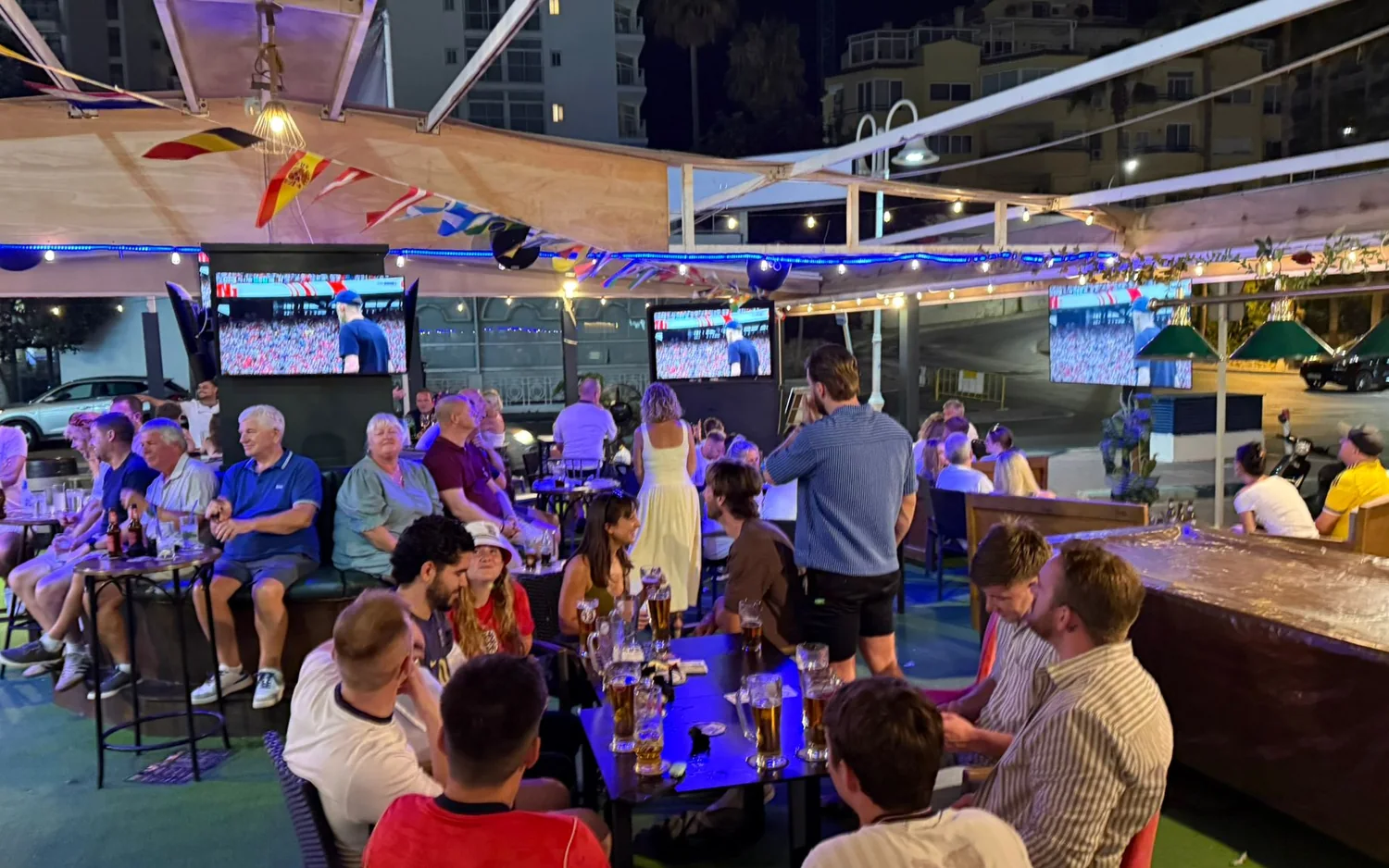 Matchday crowd on the terrace at MT Pockets